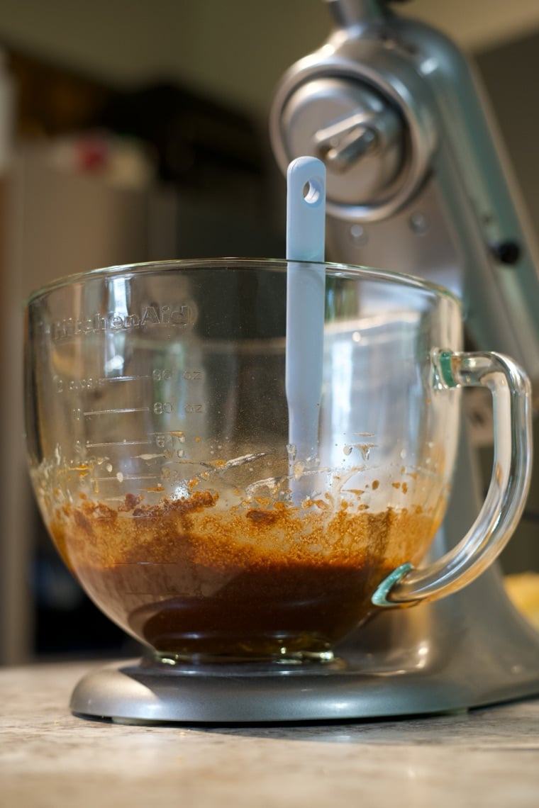 Making cinnamon rolls in a home kitchen — mixing, spreading, slicing, and panning the rolls
